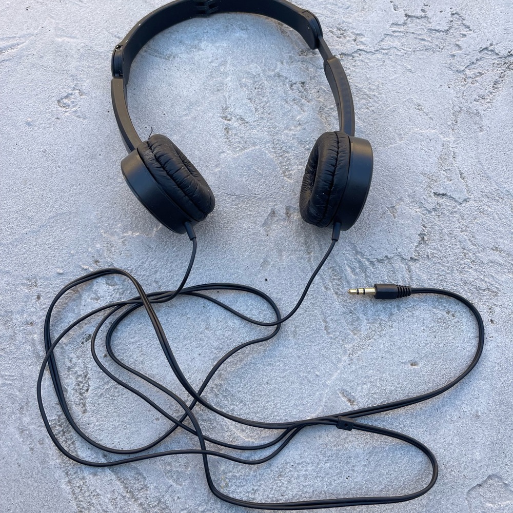 Black plug in headphones